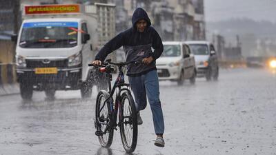 Heavy rainfall in Karnataka on Sunday. (PTI Photo) Heavy rainfall in Karnataka on Sunday. (PTI Photo)