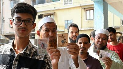 Navi Mumbai, India - May 13, 2024: People Voters show ID Cards before casting their votes during Lok Sabha Election 2024 at Zilla Parishad Urdu School at Taloja in Navi Mumbai, India, on Monday, May 13, 2024. (Photo by Bachchan Kumar/ HT PHOTO) (HT PHOTO)