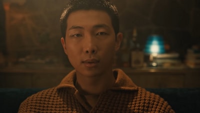 RM in a still from Come Back to Me music video.