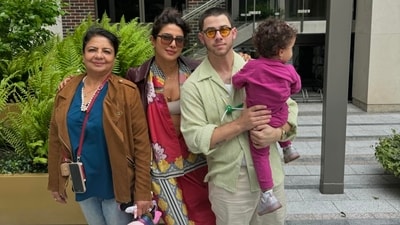 (L-R) Madhu Chopra, Priyanka Chopra, Nick Jonas and Malti Marie Chopra Jonas pose for the camera. (L-R) Madhu Chopra, Priyanka Chopra, Nick Jonas and Malti Marie Chopra Jonas pose for the camera.