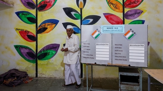 An elderly man leaves the polling booth after casting his vote in Beed, Maharashtra,(Reuters)