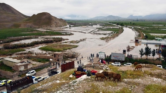 Flash floods in Afghanistan caused by unusually heavy seasonal rains have claimed the lives of hundreds of people. (AFP)
