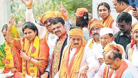 Jalgaon, Apr 26 (ANI): Maharashtra Deputy Chief Minister Devendra Fadnavis shows a victory sign during an election campaign in support of Bharatiya Janata Party (BJP) candidates from Jalgaon and Raver constituencies Smita Wagh and Raksha Khadse for the Lok Sabha polls, in Jalgaon on Thursday. (ANI Photo) (Nitin Lawate)