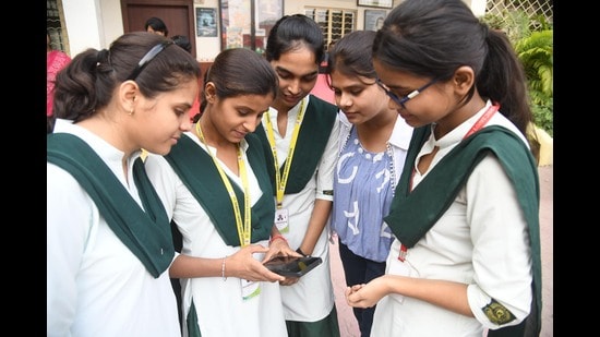 Like last year, girls performed better than boys in terms of pass percentages by two percentage points in Class 10 and 6.4 percentage points in Class 12. (Santosh Kumar/HT Photo)