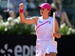 Poland's Iga Swiatek celebrates after winning the match against Germany's Angelique Kerber