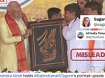 PM Modi holding art depicting Rabindranath Tagore upside-down is being shared on social media.