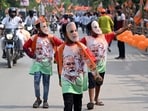 Attendees wear face masks featuring Narendra Modi, India's prime minister, ahead of a campaign rally in Varanasi, Uttar Pradesh, India, on Monday. Attendees wear face masks featuring Narendra Modi, India's prime minister, ahead of a campaign rally in Varanasi, Uttar Pradesh, India, on Monday.