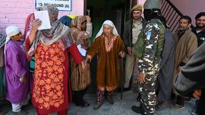 An elderly voter stepping out of a polling booth after casting her voter for the Lok Sabha elections in Srinagar. (Waseem Andrabi/HT) An elderly voter stepping out of a polling booth after casting her voter for the Lok Sabha elections in Srinagar. (Waseem Andrabi/HT)