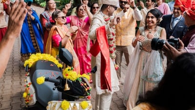 Bengaluru resident Darshan Patel danced next to an Ather EV at his wedding. (X/@peakbengaluru) Bengaluru resident Darshan Patel danced next to an Ather EV at his wedding. (X/@peakbengaluru)