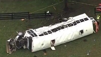 The two vehicles collided, and the bus veered off the road, through a fence, and flipped, according to FHP. (X) The two vehicles collided, and the bus veered off the road, through a fence, and flipped, according to FHP. (X)