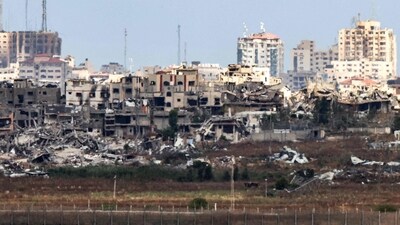 This picture taken from Israel's southern border with the Gaza Strip shows destroyed buildings in the Palestinian territory on May 14, 2024, amid the ongoing conflict between Israel and the militant group Hamas (Photo by JACK GUEZ / AFP) (AFP) This picture taken from Israel's southern border with the Gaza Strip shows destroyed buildings in the Palestinian territory on May 14, 2024, amid the ongoing conflict between Israel and the militant group Hamas (Photo by JACK GUEZ / AFP) (AFP)