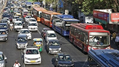In Delhi, buses come in colours including red, indigo, orange, green, and light blue. (HT Photo)