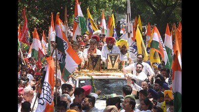 India alliance candidate Manish Tewari with Chandigarh Congress president HS Lucky and AAP Chandigarh in-charge SS Ahluwalia heading to file nomination on Tuesday. (Ravi Kumar/HT)