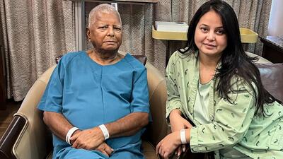 Lalu Prasad and Rohini Acharya. (PTI) Lalu Prasad and Rohini Acharya. (PTI)
