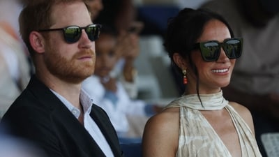 Britain's Prince Harry (L), Duke of Sussex, and Britain's Meghan (R), Duchess of Sussex, attend a charity polo game at the Ikoyi Polo Club in Lagos on May 12, 2024 as they visit Nigeria as part of celebrations of Invictus Games anniversary. (Photo by Kola Sulaimon / AFP) (AFP) Britain's Prince Harry (L), Duke of Sussex, and Britain's Meghan (R), Duchess of Sussex, attend a charity polo game at the Ikoyi Polo Club in Lagos on May 12, 2024 as they visit Nigeria as part of celebrations of Invictus Games anniversary. (Photo by Kola Sulaimon / AFP) (AFP)