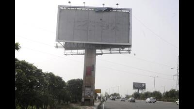 Noida, India - May 16, 2018: Noida authority to identify illegal hoardings in city , in Noida, India, on Wednesday, May 16, 2018. (Photo by Sunil Ghosh / Hindustan Times) (HT PHOTO) Noida, India - May 16, 2018: Noida authority to identify illegal hoardings in city , in Noida, India, on Wednesday, May 16, 2018. (Photo by Sunil Ghosh / Hindustan Times) (HT PHOTO)