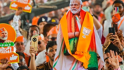 Stock market: BJP supporters during a public meeting of Prime Minister Narendra Modi for Lok Sabha elections, in Dhar, Madhya Pradesh. (PTI)