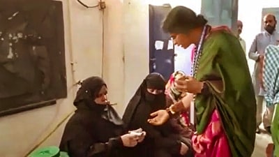BJP candidate Madhavi Latha checks identity of voters at a polling station during the fourth phase of Lok Sabha elections, in Hyderabad. (PTI) BJP candidate Madhavi Latha checks identity of voters at a polling station during the fourth phase of Lok Sabha elections, in Hyderabad. (PTI)