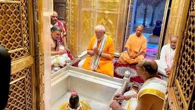 Prime Minister Narendra Modi with UP CM Yogi Adityanath offered prayers at Kashi Vishwanath Temple, in Varanasi, Uttar Pradesh, Monday. (PTI) Prime Minister Narendra Modi with UP CM Yogi Adityanath offered prayers at Kashi Vishwanath Temple, in Varanasi, Uttar Pradesh, Monday. (PTI)