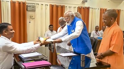 Prime Minister Narendra Modi accompanied by UP chief minister Yogi Adityanath submits his nomination papers for Lok Sabha elections, in Varanasi, Tuesday. (PTI) Prime Minister Narendra Modi accompanied by UP chief minister Yogi Adityanath submits his nomination papers for Lok Sabha elections, in Varanasi, Tuesday. (PTI)