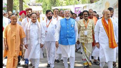 Prime Minister Narendra Modi with Union home minister Amit Shah, UP CM Yogi Adityanath and BJP national president JP Nadda leaves after filing his nomination for Lok Sabha elections, in Varanasi, Tuesday. (PTI Photo) Prime Minister Narendra Modi with Union home minister Amit Shah, UP CM Yogi Adityanath and BJP national president JP Nadda leaves after filing his nomination for Lok Sabha elections, in Varanasi, Tuesday. (PTI Photo)