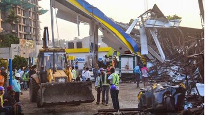 After Monday's hoarding crash in which at least 14 people died, Bhinde has been absconding, while a case under IPC section 304 was registered against him at Pantnagar police station. (PTI) After Monday's hoarding crash in which at least 14 people died, Bhinde has been absconding, while a case under IPC section 304 was registered against him at Pantnagar police station. (PTI)