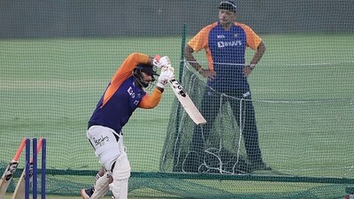 Ravi Shastri looks on as Rishabh Pant has a go in the nets (Getty)