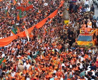Prime Minister Narendra Modi holds a roadshow with Uttar Pradesh chief minister Yogi Adityanath for the Lok Sabha elections in Varanasi on Monday. (ANI) Prime Minister Narendra Modi holds a roadshow with Uttar Pradesh chief minister Yogi Adityanath for the Lok Sabha elections in Varanasi on Monday. (ANI)