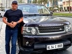 Dubai: Black-coloured Range Rover with Kerala number plate parked outside Burj Khalifa.