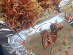 Chicken piece in paneer biryani that the man ordered from Zomato. 