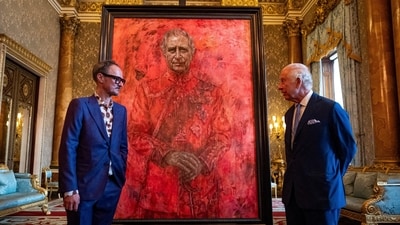 Artist Jonathan Yeo and Britain's King Charles III at the unveiling of artist Jonathan Yeo's portrait of the King, in the blue drawing room at Buckingham Palace, in London, Tuesday May 14, 2024. T(Aaron Chown/Pool Photo via AP) (AP) Artist Jonathan Yeo and Britain's King Charles III at the unveiling of artist Jonathan Yeo's portrait of the King, in the blue drawing room at Buckingham Palace, in London, Tuesday May 14, 2024. T(Aaron Chown/Pool Photo via AP) (AP)