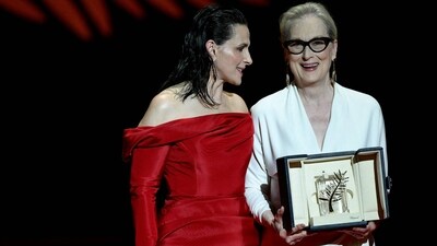 Meryl Streep (right) poses with French actor Juliette Binoche as she receives the Honorary Palme d'Or during the Opening Ceremony at the 77th edition of the Cannes Film Festival in Cannes, southern France, on May 14, 2024. (AFP) Meryl Streep (right) poses with French actor Juliette Binoche as she receives the Honorary Palme d'Or during the Opening Ceremony at the 77th edition of the Cannes Film Festival in Cannes, southern France, on May 14, 2024. (AFP)