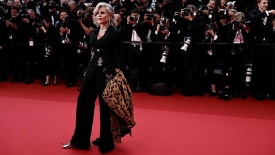 Cannes 2024: Jane Fonda attended the Opening Ceremony and the screening of The Second Act at the 77th edition of the Cannes Film Festival. She walked the red carpet in a black Elie Saab jumpsuit and leopard-print duster. (AFP) Cannes 2024: Jane Fonda attended the Opening Ceremony and the screening of The Second Act at the 77th edition of the Cannes Film Festival. She walked the red carpet in a black Elie Saab jumpsuit and leopard-print duster. (AFP)