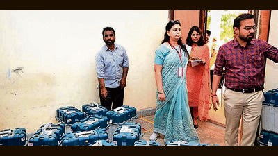 General observer Divya Mittal with other officials during an inspections at strong rooms in Ludhiana on Wednesday. (HT Photo)