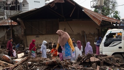He said that 58 bodies had been pulled from mud and rivers by Wednesday, mostly in the worst-hit Agam and Tanah Datar districts, while rescuers are searching for 35 people who are reportedly missing. About 33 villagers were injured. (AP) He said that 58 bodies had been pulled from mud and rivers by Wednesday, mostly in the worst-hit Agam and Tanah Datar districts, while rescuers are searching for 35 people who are reportedly missing. About 33 villagers were injured. (AP)