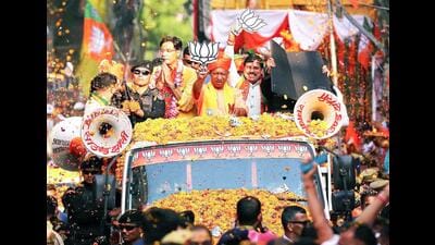 Madhya Pradesh Chief Minister Mohan Yadav and Uttar Pradesh Chief Minister Yogi Adityanath hold a roadshow in support of the BJP candidate for Jhansi, Anurag Sharma for the Lok Sabha election, in Jhansi on Wednesday (ANI) Madhya Pradesh Chief Minister Mohan Yadav and Uttar Pradesh Chief Minister Yogi Adityanath hold a roadshow in support of the BJP candidate for Jhansi, Anurag Sharma for the Lok Sabha election, in Jhansi on Wednesday (ANI)