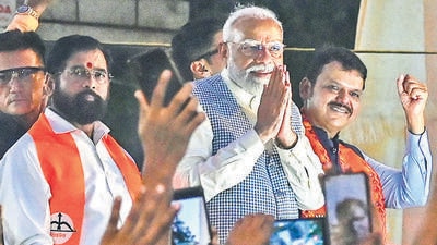 Modi with Eknath Shinde and Devendra Fadnavis during the a road show in Ghatkopar on Wednesday. (Photo by Raju Shinde/HT Photo) Modi with Eknath Shinde and Devendra Fadnavis during the a road show in Ghatkopar on Wednesday. (Photo by Raju Shinde/HT Photo)