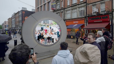 People view the live stream portal between Dublin and New York, in Dublin, Ireland, on Monday May 13, 2024. (Niall Carson/PA via AP) (AP) People view the live stream portal between Dublin and New York, in Dublin, Ireland, on Monday May 13, 2024. (Niall Carson/PA via AP) (AP)