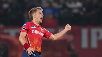 Punjab Kings captain Sam Curran celebrates the wicket of Royal Challengers Bengaluru's Rajat Patidar (PTI) Punjab Kings captain Sam Curran celebrates the wicket of Royal Challengers Bengaluru's Rajat Patidar (PTI)