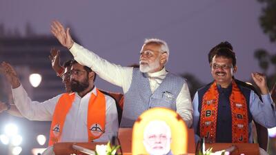 Prime Minister Narendra Modi along with Maharashtra chief minister Eknath Shinde and deputy CM Devendra Fadnavis at a roadshow for the Lok Sabha elections, at Ghatkopar in Mumbai on Wednesday. (ANI) Prime Minister Narendra Modi along with Maharashtra chief minister Eknath Shinde and deputy CM Devendra Fadnavis at a roadshow for the Lok Sabha elections, at Ghatkopar in Mumbai on Wednesday. (ANI)
