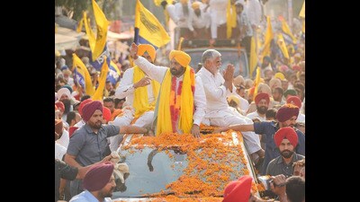 Punjab chief minister Bhagwant Singh Mann during a roadshow on Wednesday. (HT photo) Punjab chief minister Bhagwant Singh Mann during a roadshow on Wednesday. (HT photo)