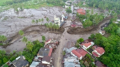 Rain and flash floods hit Indonesia's Sumatra Island over the weekend leaving at least 58 people dead and another 35 missing. (AFP) Rain and flash floods hit Indonesia's Sumatra Island over the weekend leaving at least 58 people dead and another 35 missing. (AFP)