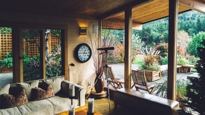 2. Reviving Timeless Elegance: The Power of Ceiling Designs: Wooden ceilings have long been associated with ethnic appeal, adding warmth and character to homes. In 2024, this aesthetic can be easily recreated by installing false Soffit ceilings. These adaptable, low-maintenance ceilings have the appearance of real wood and come in a variety of treatments and designs to suit different tastes. From traditional to contemporary, these soffit ceiling solutions may boost a home's overall environment, giving a touch of elegance and sophistication that goes beyond seasonal trends. (Photo by Unsplash)