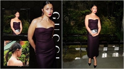 Coming to the dress for the night, Alia wore a strapless black midi dress featuring a cinched waistline, fitted bust, and a bodycon silhouette accentuating her svelte frame. She wore the outfit with black pumps, a Gucci handbag, and a centre-parted sleek ponytail styled with a satin black bow. (Instagram) Coming to the dress for the night, Alia wore a strapless black midi dress featuring a cinched waistline, fitted bust, and a bodycon silhouette accentuating her svelte frame. She wore the outfit with black pumps, a Gucci handbag, and a centre-parted sleek ponytail styled with a satin black bow. (Instagram)