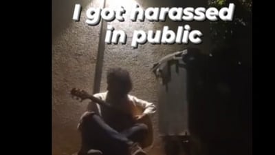 Snapshot of the musician playing guitar in public. Snapshot of the musician playing guitar in public.