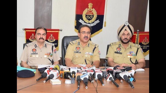 Special director general of police (law and order) Arpit Shukla, along with DIG (border range) Rakesh Kaushal and Amritsar police commissioner Gurpreet Singh Bhullar, addressing a press conference in Amritsar. (HT photo)
