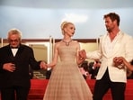 Australian actor Chris Hemsworth (right), British-US actor Anya Taylor-Joy (centre) and Australian director and screenwriter George Miller pose after the screening of the film Furiosa: A Mad Max Saga at the 77th edition of the Cannes Film Festival in Cannes, southern France, on May 15, 2024. (AFP)