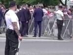A man aims a handgun at Slovakia's Prime Minister Robert Fico as he was approaching people after a Slovak government meeting in Handlova, Slovakia, May 15, 2024  in this screen grab from a video. 