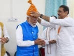 Varanasi, May 14 (ANI): Prime Minister Narendra Modi meets with Nationalist Congress Party Working President Praful Patel and NDA leaders during his nomination filing for the Lok Sabha elections, in Varanasi on Tuesday. Defence Minister Rajnath Singh and Union Home Minister Amit Shah are also seen. (ANI Photo) (BJP)