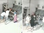 The image shows a group of men beating a couple and their pet dog. The image shows a group of men beating a couple and their pet dog.